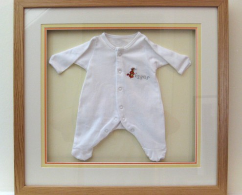bespoke picture framing 3d objects children's clothes