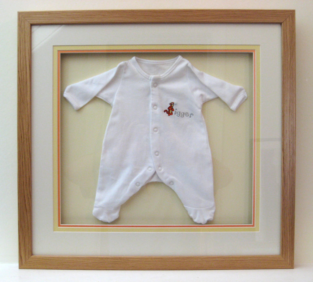 bespoke picture framing 3d objects children's clothes
